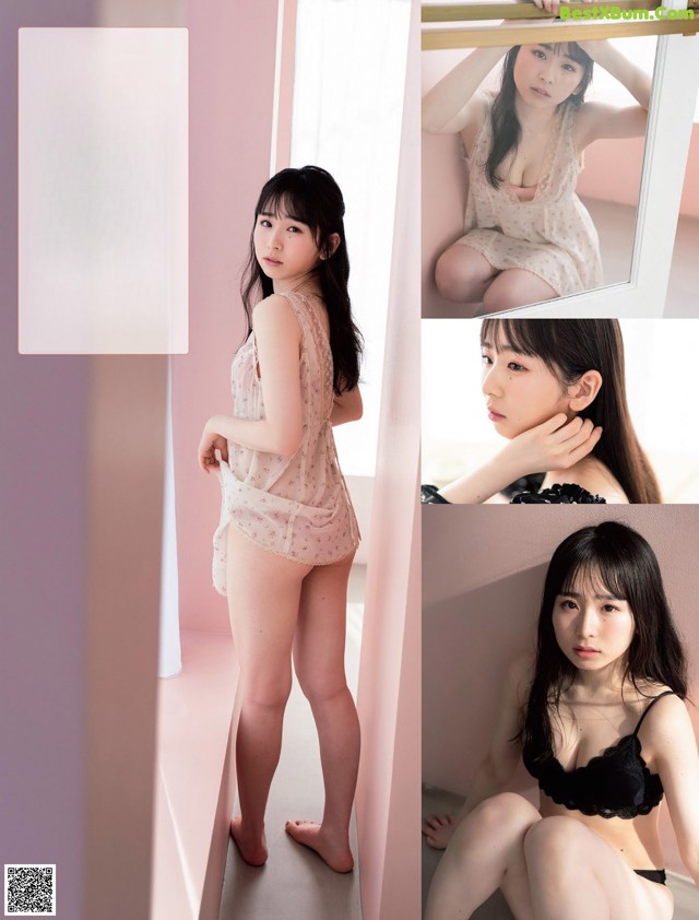 A woman in lingerie posing in front of a mirror.