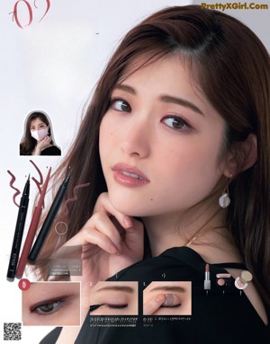 A magazine page with a picture of a woman with long eyelashes.