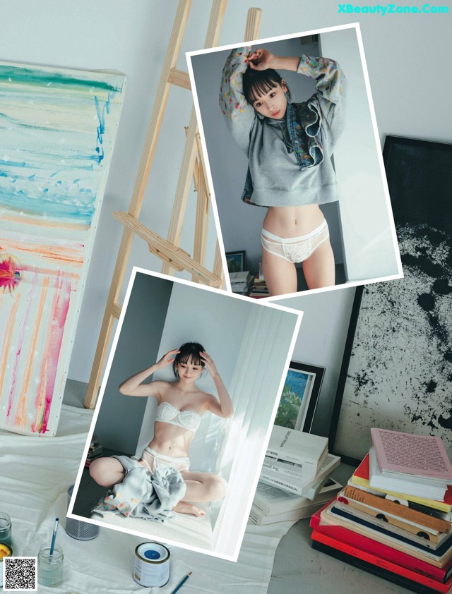 A woman sitting on top of a bed next to a painting.